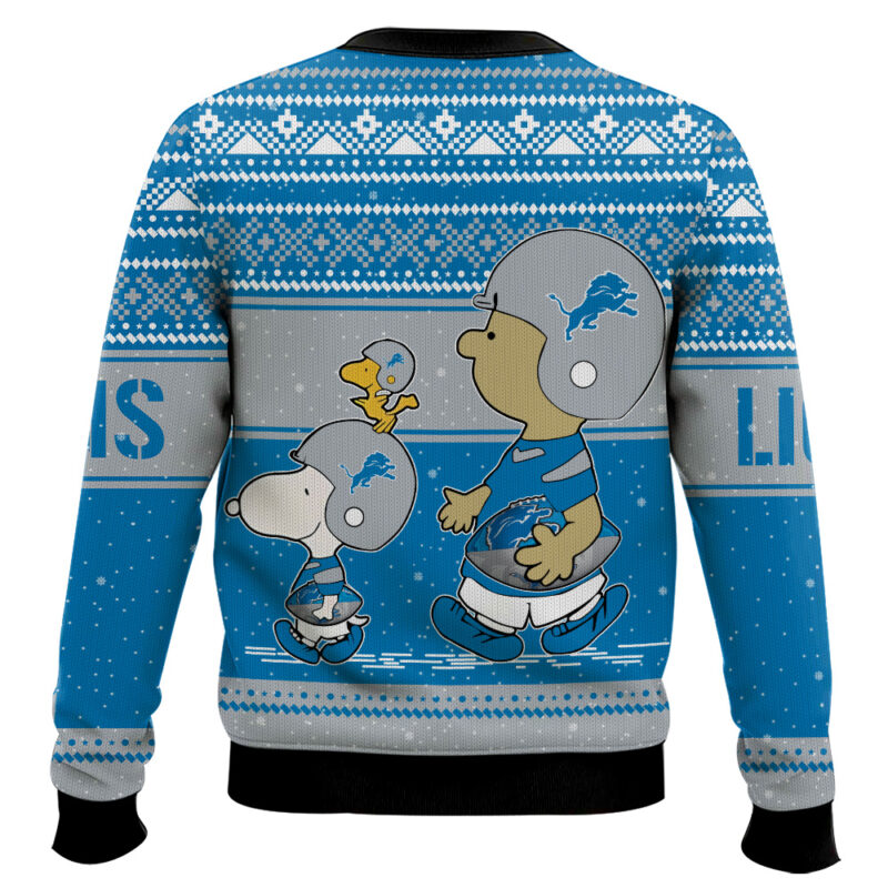 Hooktab Snoopy And Charlie Brown Detroit Lions Ugly Sweater Hooktab Snoopy And Charlie Brown Detroit Lions Ugly Sweater