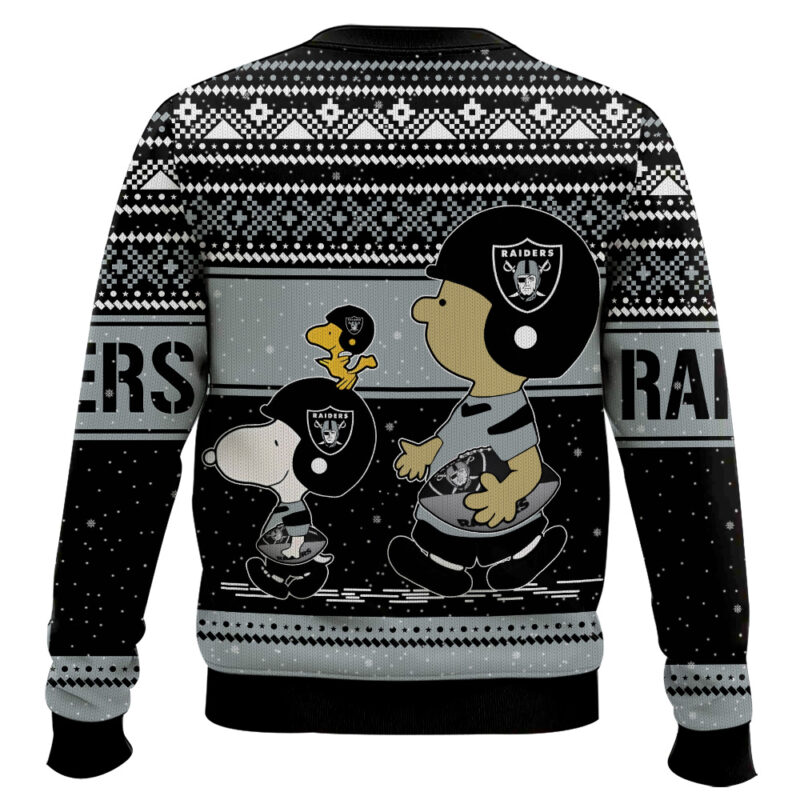 Hooktab Snoopy And Charlie Brown Las Vegas Raiders Ugly Sweater Hooktab Snoopy And Charlie Brown Las Vegas Raiders Ugly Sweater